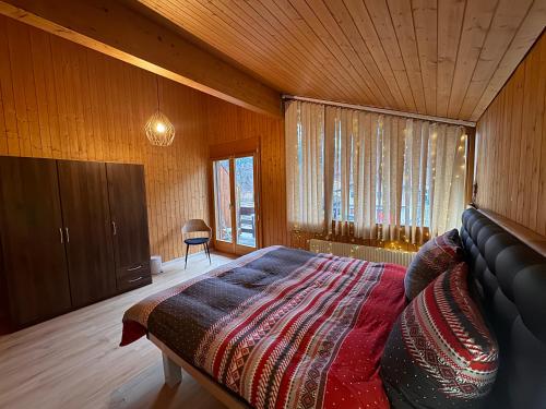 Postel nebo postele na pokoji v ubytování Big Apartment nearby Interlaken Parking