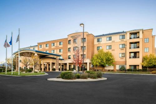a building with a parking lot in front of it at Courtyard Carson City in Carson City