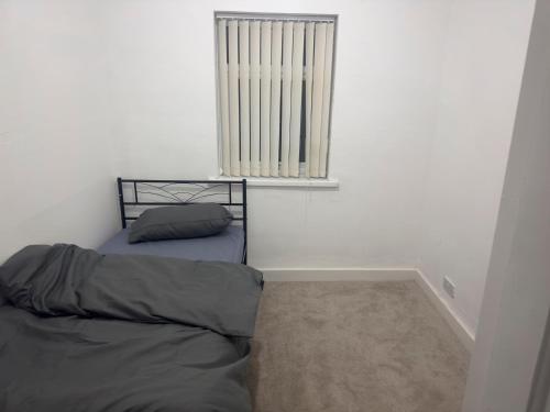 En eller flere senge i et værelse på hougton