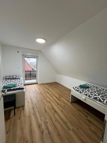 Postel nebo postele na pokoji v ubytování Monteurswohnung Mesum