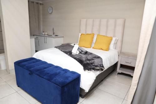 Ένα ή περισσότερα κρεβάτια σε δωμάτιο στο Lethabo Guesthouse