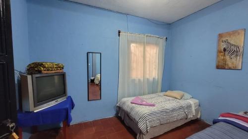 Postel nebo postele na pokoji v ubytování Casa Maya Vibes