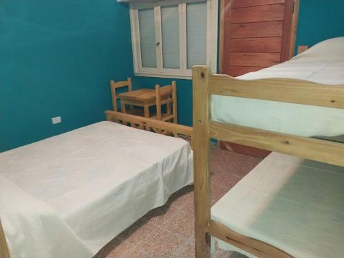 Ένα ή περισσότερα κρεβάτια σε δωμάτιο στο La Huella