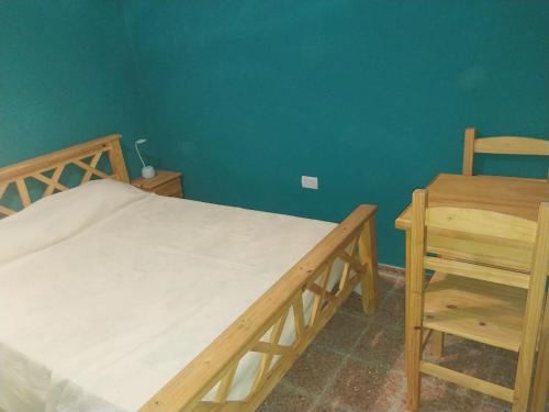 Ένα ή περισσότερα κρεβάτια σε δωμάτιο στο La Huella