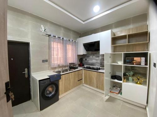 Η κουζίνα ή μικρή κουζίνα στο Eliora Apartment