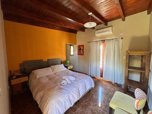 Ένα ή περισσότερα κρεβάτια σε δωμάτιο στο Kallpa