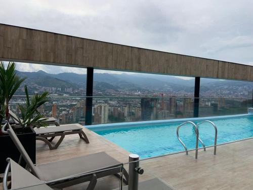 Swimmingpoolen hos eller tæt på NOK Beautiful 2BR Apartment in El Poblado