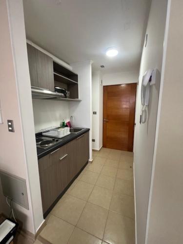 Køkken eller tekøkken på bulnes urbano suites 1