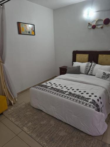 Llit o llits en una habitació de Divin Appart