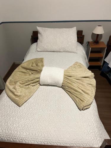 Кровать или кровати в номере Casa Campos do Jordão