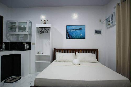 Ένα ή περισσότερα κρεβάτια σε δωμάτιο στο Jmt Star's Inn