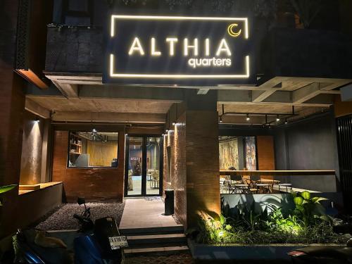 a restaurant with a sign that reads alita queries at Althia Capsule Quarters in Badung