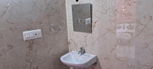 Koupelna v ubytování Hill palace Inn