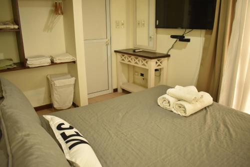 En eller flere senge i et værelse på Cabañas del Mirador