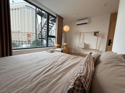 Postel nebo postele na pokoji v ubytování Reka Home