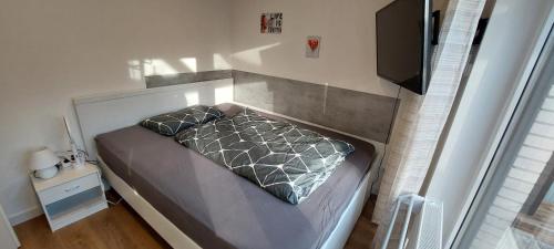 Ένα ή περισσότερα κρεβάτια σε δωμάτιο στο Ferienwohnung Monteurs Wohnung am Teutoburger Wald