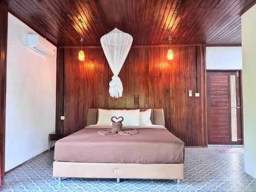 Ένα ή περισσότερα κρεβάτια σε δωμάτιο στο Bayview Hill Resort