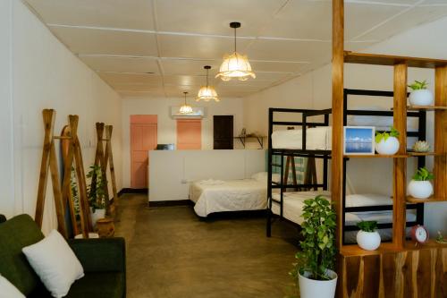 Postel nebo postele na pokoji v ubytování Itzá Loft