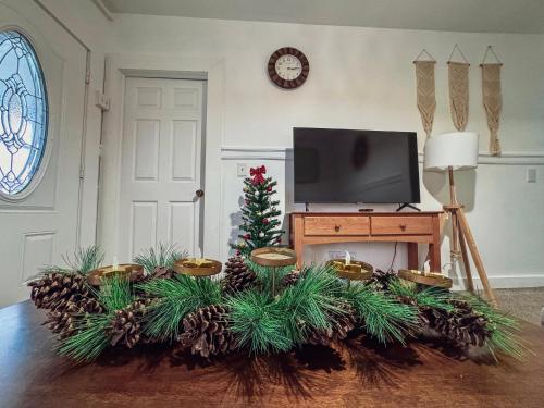 Μια τηλεόραση ή/και κέντρο ψυχαγωγίας στο Alwaves Family 3 Bedroom Beach Apartment