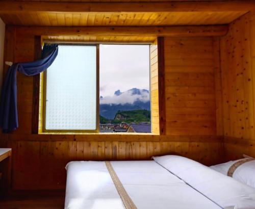 En eller flere senge i et værelse på January Inn