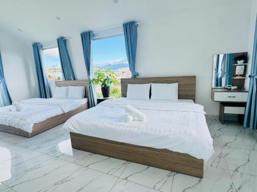 Ένα ή περισσότερα κρεβάτια σε δωμάτιο στο Sunrise Guest House