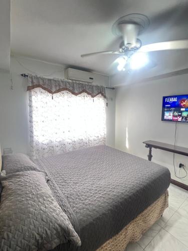 Ένα ή περισσότερα κρεβάτια σε δωμάτιο στο White River Ocho Rios Suite, Luxury