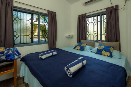 Ένα ή περισσότερα κρεβάτια σε δωμάτιο στο Seaview White beach Villa on Talpona