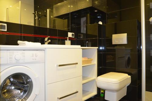 Kúpeľňa v ubytovaní Apartamenty Szczęśliwe Sny