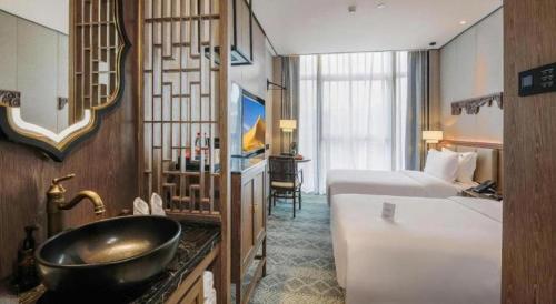 Μια τηλεόραση ή/και κέντρο ψυχαγωγίας στο Shenzhen Apex Hotel (Technology Park Branch)