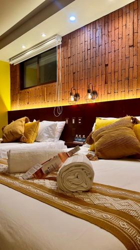 Postel nebo postele na pokoji v ubytování Hotel Boutique Casa Gopar