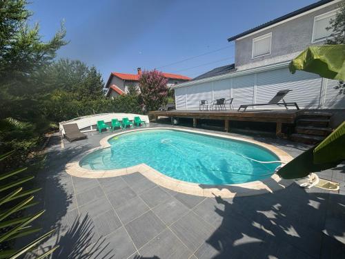 Swimmingpoolen hos eller tæt på Grande maison zen