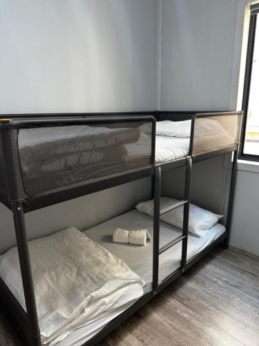 En eller flere senge i et værelse på BEST home! YOUR new FAVOURITE! Book Now!