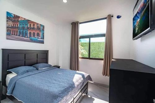 Una cama o camas en una habitación de Havana Jaco