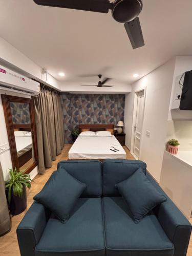 Ένα ή περισσότερα κρεβάτια σε δωμάτιο στο Halo Urban Suite