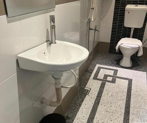 Koupelna v ubytování Ghazrins Hotel Dataran Larkin