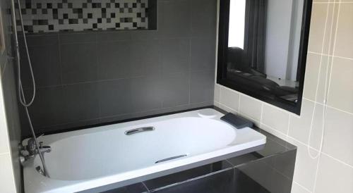 Koupelna v ubytování S-Tawan Hotel & Convention