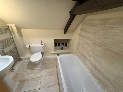 Ένα μπάνιο στο Lowther Cottage - Lake District Cottage with Log Burner