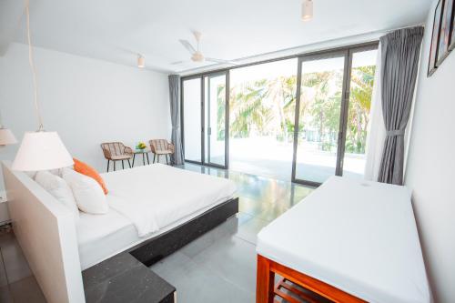 Postel nebo postele na pokoji v ubytování VILLA 5 BED ROOMS SANCTUARY HỒ TRÀM ll Private Beach ll BBQ