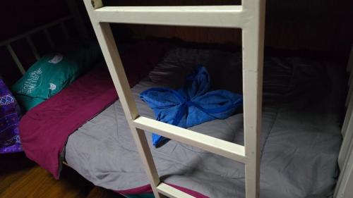 Ένα ή περισσότερα κρεβάτια σε δωμάτιο στο Sunny house hostel