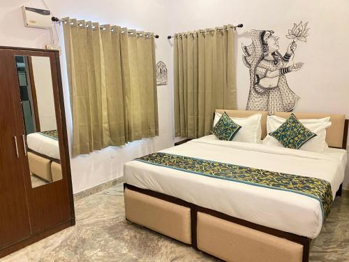 Postel nebo postele na pokoji v ubytování Stamps By Eight Continents, Pushkar