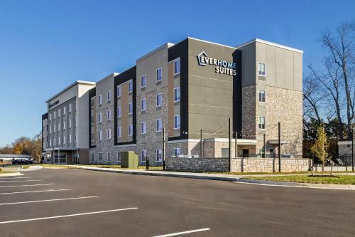 a building with a sign on the side of it at Everhome Suites Bowling Green by Choice Hotels in Bowling Green