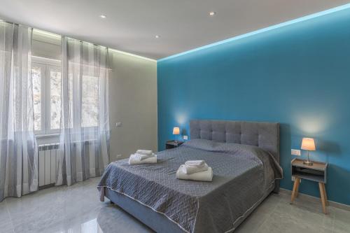 Ένα ή περισσότερα κρεβάτια σε δωμάτιο στο Alma Mare