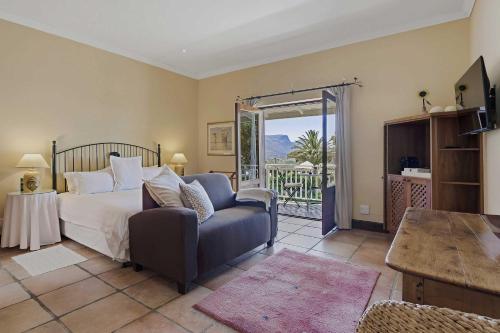 Ένα ή περισσότερα κρεβάτια σε δωμάτιο στο High Timbers Lodge