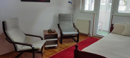 Posezení v ubytování HushHush Apartman