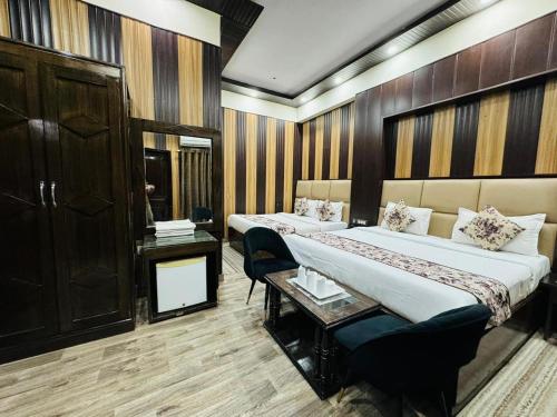 Postel nebo postele na pokoji v ubytování Hotel Radiance, Karol Bagh, New Delhi