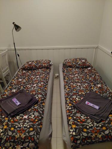 Giường trong phòng chung tại Levistar studio with sauna