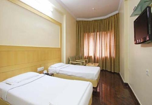 Μια τηλεόραση ή/και κέντρο ψυχαγωγίας στο Raj classic inn