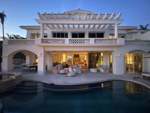 a house with a pool in front of it at Casa Sirena in San José del Cabo