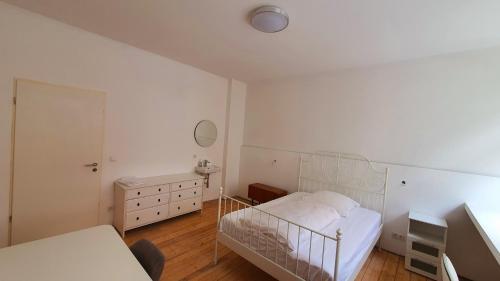 Ένα ή περισσότερα κρεβάτια σε δωμάτιο στο Zimmer im Erdgeschoss