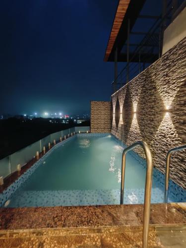 Swimmingpoolen hos eller tæt på Sharvilla Resort